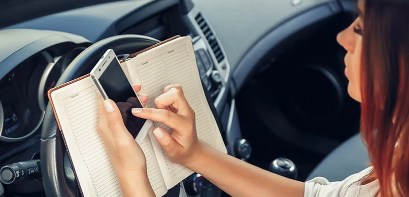 From Banning Texting While Driving to Any Distracted Driving?